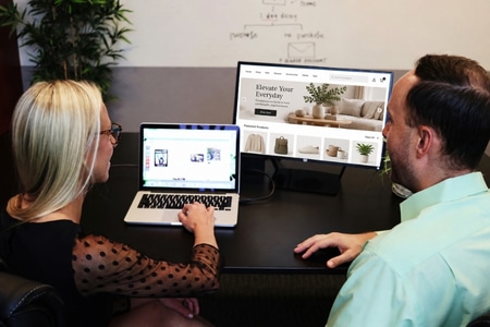 two business owners choosing an eCommerce website platform