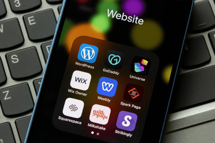 Wix, Wordpress, and Squarespace apps on a phone