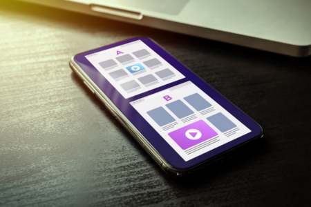 Two different layouts being tested on a phone using A/B testing