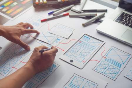 UX designer working on a UX wireframe for compound SEO
