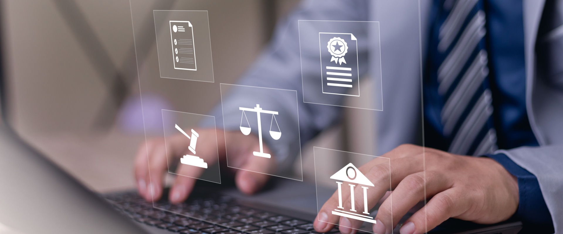 Man on computer with digitalized graphic in front