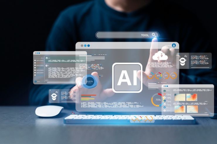 Person sitting at a computer using AI tools.