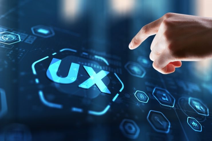 UX text with a man's hand.