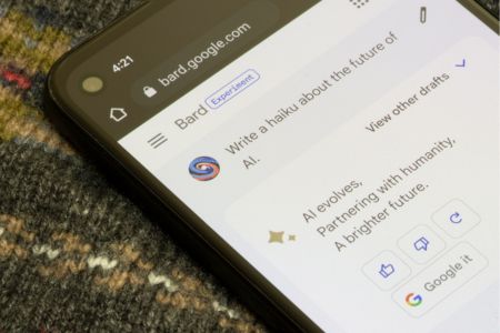 Mobile phone displaying AI app.