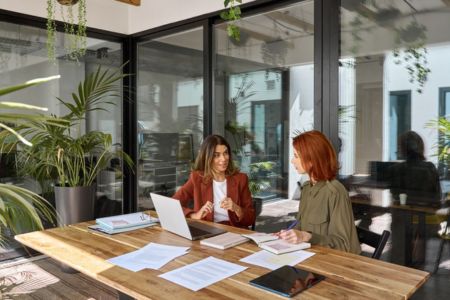 SEO professional with client.