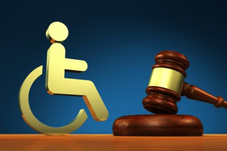 visualization of a wheelchair and a judge's gavel.