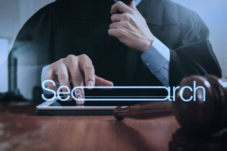 Legal professional with internet search bar visualization.