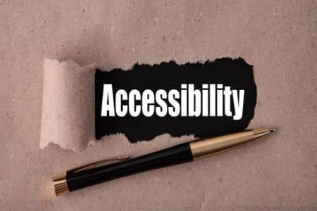 Paper with accessibility word next to pen.