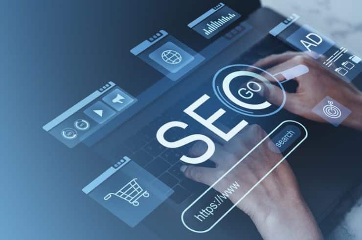Person with laptop and SEO visualization