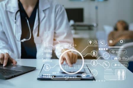 doctor reviewing patient's safe digital tracking metrics.