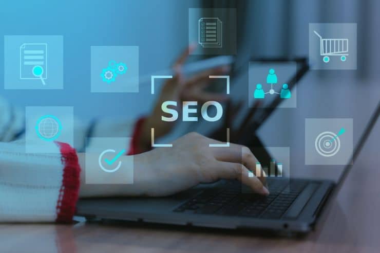 seo optimization work on a laptop with digital marketing icons and analytics
