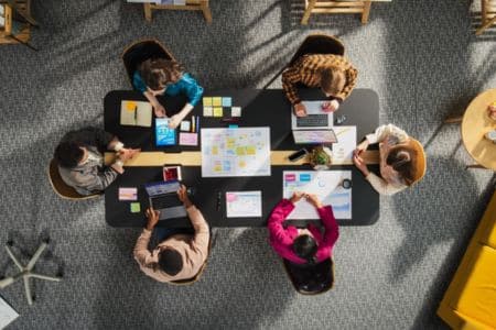 digital marketing team planning seo and AI content strategy together