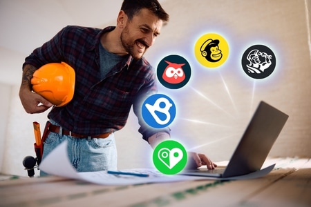 home services business owner using marketing tools on laptop